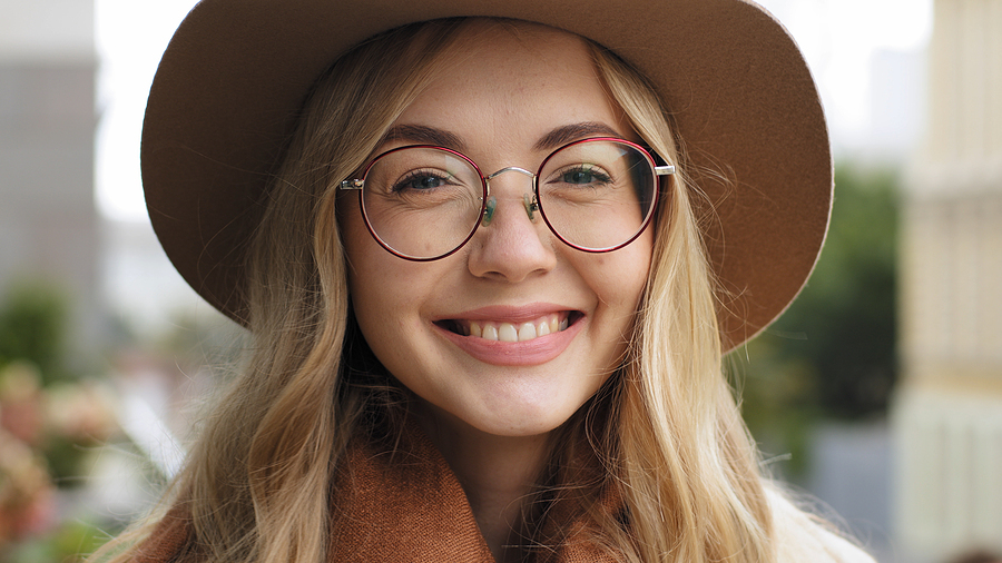 Close-up Smiling Caucasian 20s Woman Smile Broadly With White Te